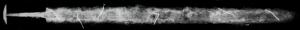 the x - ray picture of the sword with visible inlaying of the pommel and pattern-welding of the blade
